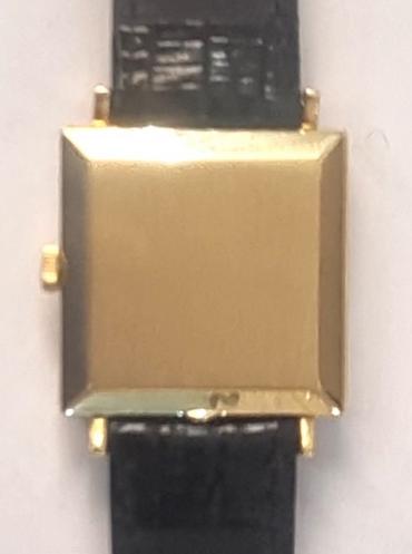 Swiss International Watch Co., Schaffhausen, manual wind square faced wrist watch c1960s in an 18K gold case with Swiss hallmarks on a black leather strap with gilt buckle. Signed gold coloured dial with polished gilt and black baton hours with matching hands and sweep seconds. Swiss made IWC signed jewelled lever calibre C.401 movement numbered 1677976 with signed case back numbered 1724164 R 1313.