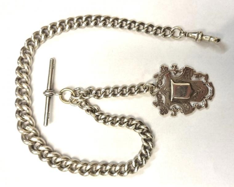 Silver graduated single Albert pocket watch chain c1900 hallmarked throughout with 'T' bar, snap and silver medallion with Birmingham hallmark. Length 12.5", weight 63 grams.