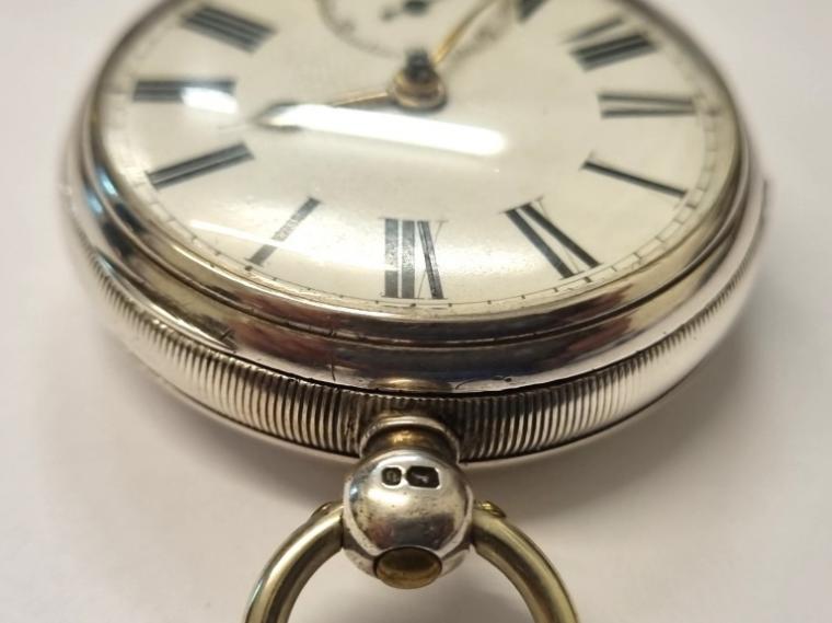 English silver cased fusee lever pocket watch by John Sharpe of York hallmarked for London c1876. Key wind and time change with white enamel dial and black Roman hours with gilt hour and minute hands and subsidiary seconds dial. Full plate fusee movement with English jewelled lever escapement and numbered 50669. Case diameter - 52mm.