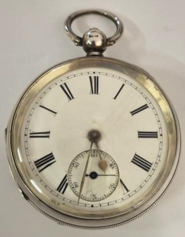 English full plate lever pocket watch by William Erhardt in a silver case hallmarked for Birmingham c1903, signed 'WE' and numbered 542573. Key wind and time change with white enamel dial with black Roman hours and gilt hands with subsidiary seconds dial. Back plate numbered 542573 with full plate lever movement with decorated cock piece and split bi-metallic jewelled balance. Case Diameter - 52mm.