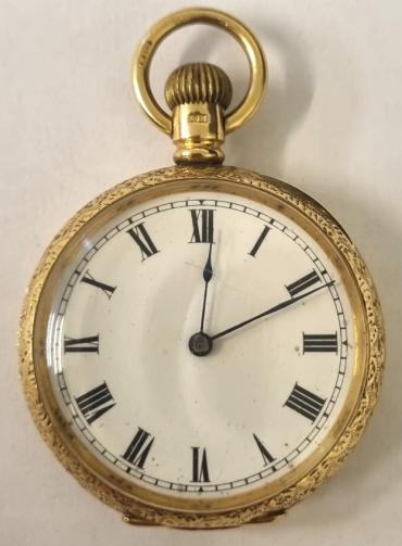 American Waltham dress fob pocket watch with top wind and time change in an 18ct gold Dennison case with Birmingham hallmarks for c1907. White enamelled dial with black Roman hours and black steel hands. American Waltham Watch Company signed jewelled lever movement with split bi-metallic balance and overcoil hairspring and numbered 14582056 with case back numbered A12186.