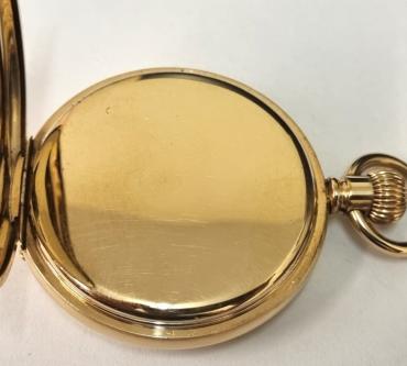 American Waltham Watch Co., full hunter 'Traveler' pocket watch circa 1900 in a gold plated Dennison case numbered 43887. Top wind and time change with plain outer case over a signed white enamel dial with black Roman hours and gilt hands with a subsidiary seconds dial at 6 o/c. Signed American Waltham 7 jewel jewelled lever movement with split bi-metallic balance and overcoil hairspring and numbered 12172893.