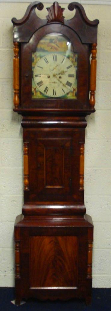 Imposing flame mahogany cased, grandfather longcase clock. Swan neck hood with contrasting light coloured turned wood pillars and further matching turned pillar case decoration. Painted face with subsidiary seconds and date display dials. Bell striking, 8 day movement circa 1850, signed to the dial R.Easby, Durham.