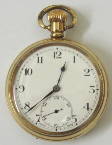 Swiss Revue pocket watch in a Dennison gold plated case with top wind and time change. White enamel dial with black arabic hours and blued steel hands and subsidiary seconds dial at 6 o/c. Swiss manual wind lever movement with 7 jewels, the Dennison watch case back numbered #221208.