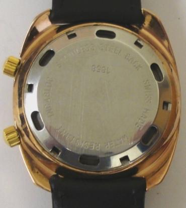 Swiss Emperor alarm wrist watch in a gold plated case with stainless steel back and secondary dust cover, on a black leather strap with gilt buckle. Gilt dial with black minute track and baton hour markers, gilt luminous insert hands and sweep seconds. Red alarm pointer hand and date display at 3 o/c. Swiss 17 jewel incabloc manual wind movement.