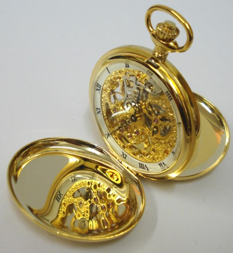 New gold plated full hunter pocket watch by the Rapport Company complete with all paperwork and box. Top wind and time change mechanical skeletonised movement with white chapter ring, black roman hour markers and ornate black painted hands.
