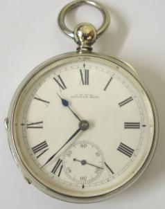 American A.W.W & Co Waltham nickel cased open face pocket watch with key wind and time change. White enamel dial with black roman hours, blued steel hands and subsidiary seconds dial. Signed Waltham jeweled lever safety pinion movement with split bi-metallic balance and numbered #4914409 with case number #679.