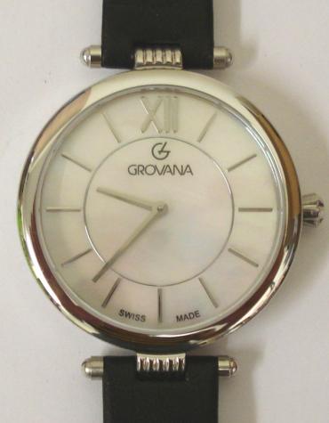 Brand new mid-size quartz wrist watch by Grovana in an all stainless steel case with black leather strap and silver buckle. Sapphire crystal over a mother of pearl dial with polished silver hours and matching hands. Brand new model 4450.1CK watch number 1533 water resistant to 50 metres complete with box, all paperwork and 2 year manufacturer's guarantee.