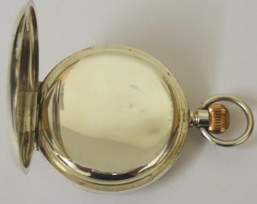Swiss 'The Spartan' silver cased full hunter pocket watch with top wind and time change. White enamel dial with black Roman hours, gilt hands and subsidiary seconds dial. 7jewel jewelled lever movement with bi-metallic balance and overcoil hairspring. The London import case is numbered #167475 and is hallmarked for circa 1918.