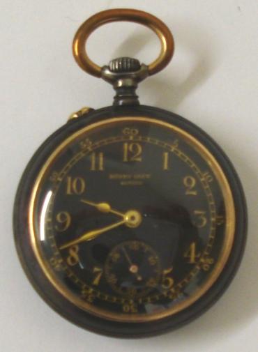 Swiss gun metal cased petite pocket watch by Henry Capt, Geneva with applied gold monogram back. Top wind and rocking bar time change with black enamel dial and gilt Arabic hours and outer minute track with matching gilt hands hands and subsidiary seconds dial. Top quality signed jewelled lever movement with wolf teeth gearing and numbered #40180 with initials FB and #0388 on the case back.