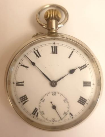 Swiss silver plated pocket watch by Baume and Co. circa1920s. Top wind and rocking bar time change with white enamel dial and black Roman hours with black steel hands and a subsidiary seconds dial at 6 o/c. Signed seven jewel lever movement with bi-metallic balance with case back internally signed and numbered #729028.