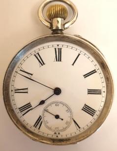 Swiss silver cased pocket watch, maker unknown circa 1910. Top wind and rocking bar time change with white enamel dial and black Roman hours with blued steel hands and subsidiary seconds dial at 6 o/c. Swiss cylinder escapement and split bar movement with case stamped '0.935' and numbered #135423.