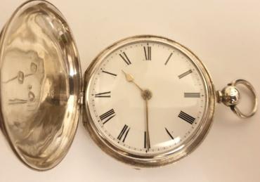 English silver cased key wind and time change fusee verge full hunter pocket watch by Mallett of Barnstaple, hallmarked throughout for London c1856. White enamel dial with black Roman hours and gilt hands. Signed and engraved back plate with plain cock piece and numbered #37184, the numbering repeated on the casework which also bears the initials 'ED'.
