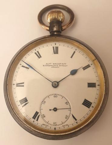 Swiss Omega gun metal cased pocket watch retailed by Alfd. Wagstaff, Bishop Gate Street, London, late C19th. Top wind and time change with white enamel dial with black Roman hours and blued steel hands with subsidiary seconds dial at 6 o/c. Swiss Omega jewelled lever escapement with split bi-metallic balance in a Omega signed gun metal case numbered 3051907.