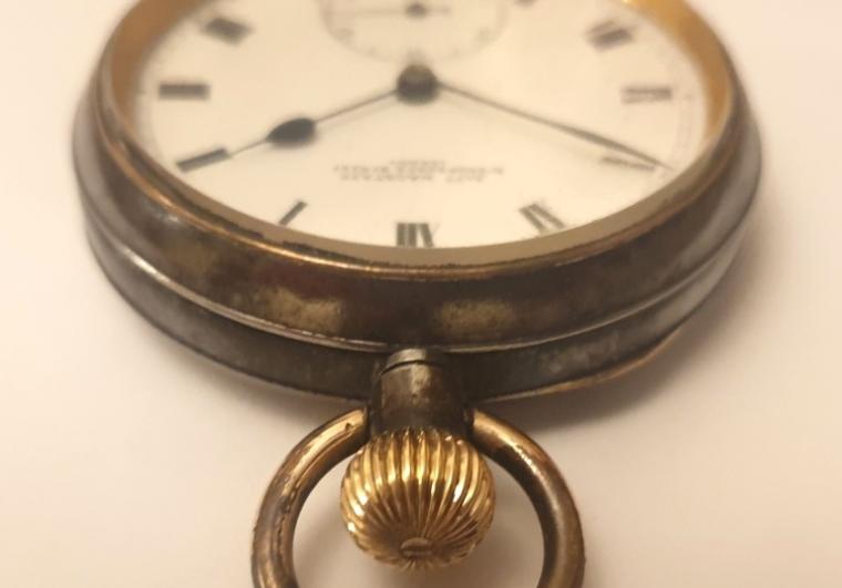 Swiss Omega gun metal cased pocket watch retailed by Alfd. Wagstaff, Bishop Gate Street, London, late C19th. Top wind and time change with white enamel dial with black Roman hours and blued steel hands with subsidiary seconds dial at 6 o/c. Swiss Omega jewelled lever escapement with split bi-metallic balance in a Omega signed gun metal case numbered 3051907.