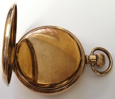 Early C20th American A.W.W Co. Waltham half hunter pocket watch in a Dennison gold plated case with top wind and time change. External blue Roman chapter ring on the outer case, internal white enamel dial with black Roman hours and gilt hands with a subsidiary seconds dial at 6 o/c. Signed American 15 jewel jewelled lever escapement with overcoil hairspring and split bi-metallic balance with micro adjuster, the movement numbered 16983845 and case numbered 724630.