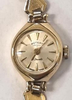 Ladies Swiss Rotary 9ct gold cased manual wind wrist watch on gold plated bracelet. Signed silvered dial with polished gilt hour markers and matching hands. 21 jewel jewelled lever AS movement calibre 1012 with case back numbered 45181 and hallmarked for London c1962.
