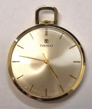Swiss Tissot 14ct gold dress pocket watch c1960 with top wind and time change. Signed silvered dial with gilt baton hours and polished gilt hands with sweep seconds hand. Signed Swiss 17 jewel jewelled lever movement calibre 781-1 numbered 8466150 with the case back signed and numbered 41303-20.